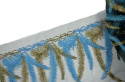 Embroidered lace with feather pattern