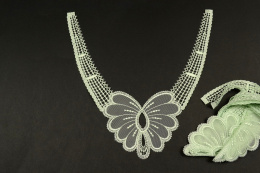 Częściowo haftowana miętowa aplikacja