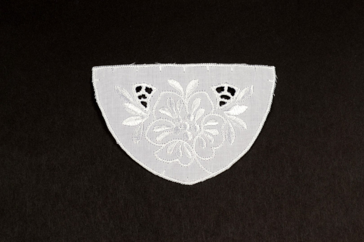Embroidered applique on cotton