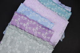 Miękki szary haft na białym elastycznym tiulu 0,5mb