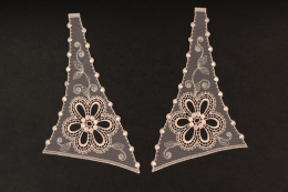 Embroidered appliques on tulle pairs