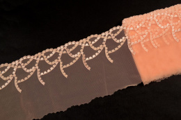 Brzoskwiniowy stabilny haft