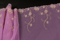 Embroidered lace in lila color