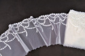 White embroidery on tulle