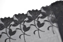 Delicate black embroidery in flowers
