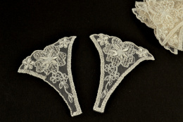 Kremowe aplikacje na tiulu 2szt.