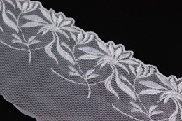 Elastyczny biały haft na tiulu 1mb